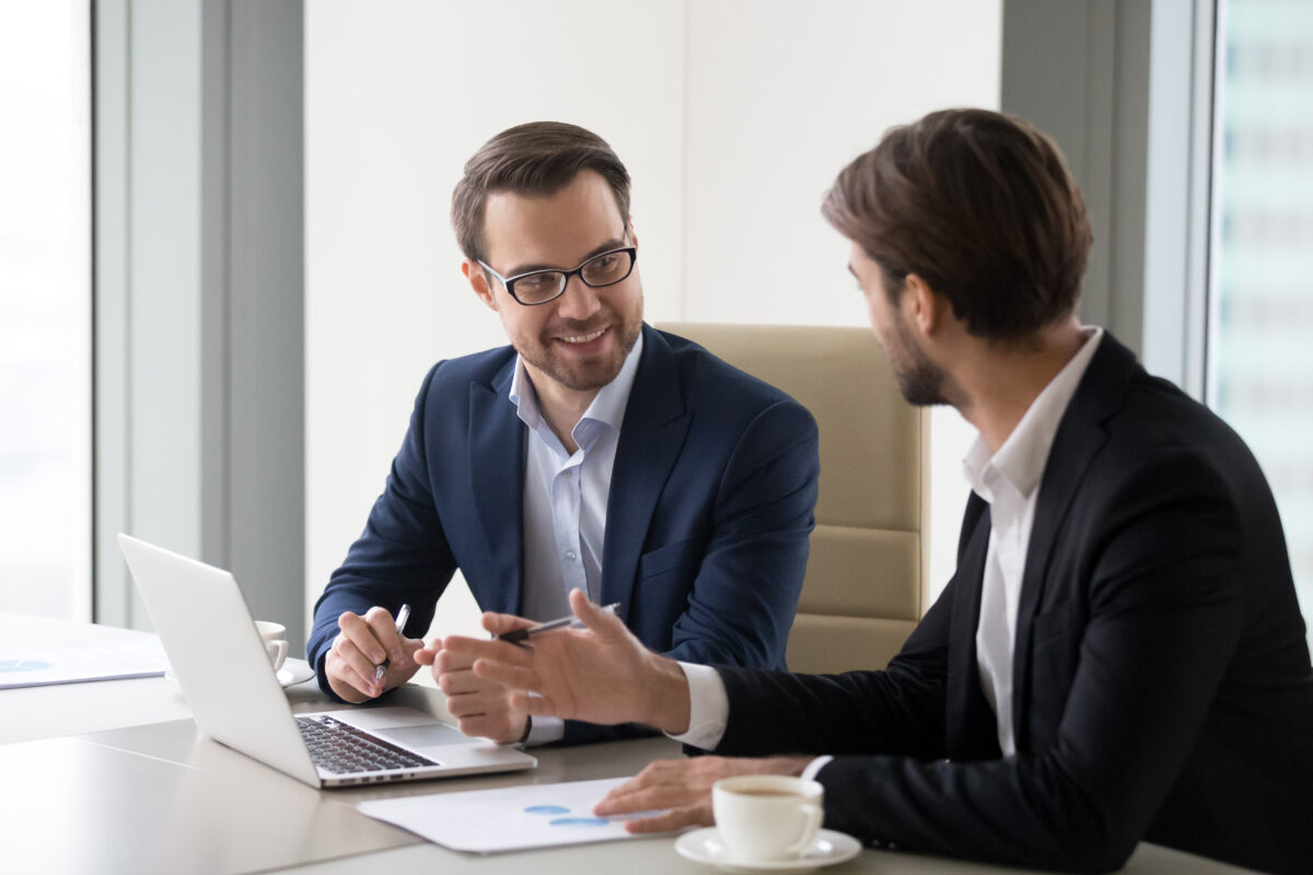 two businesspeople having