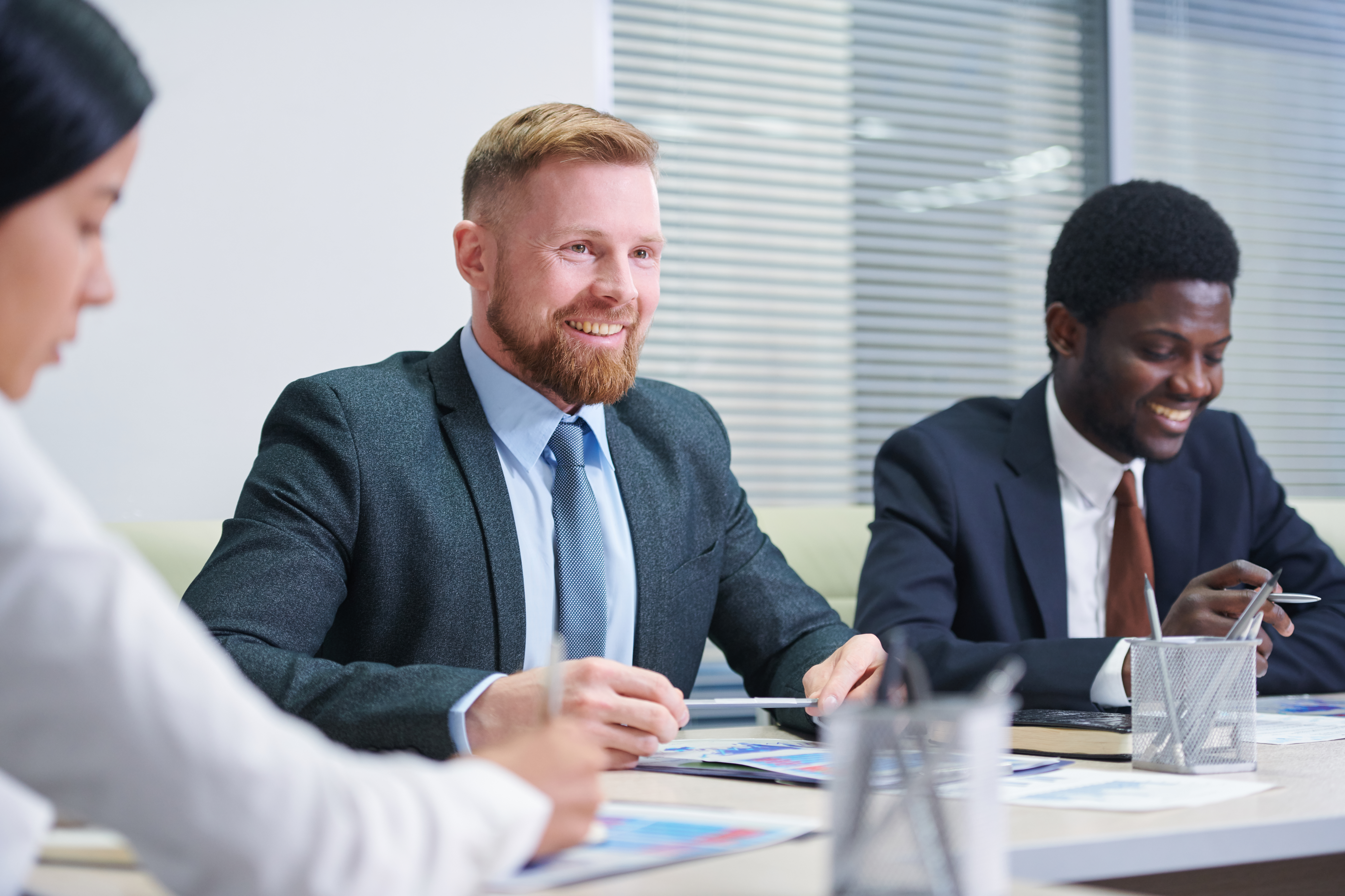 businesspeople smiling at