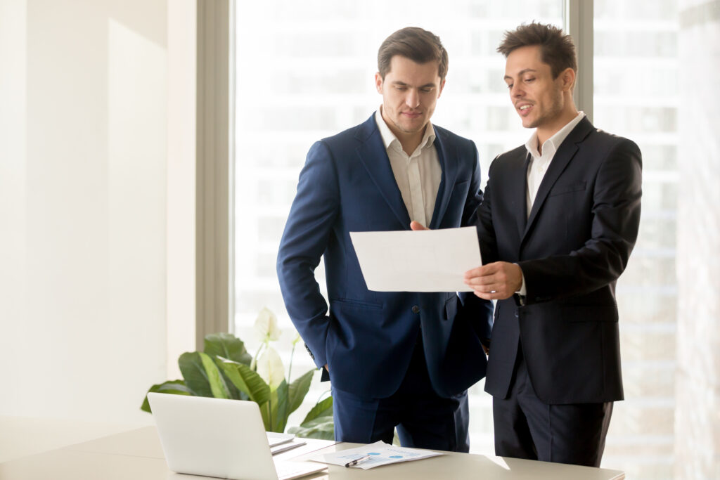 two businessmen discussing